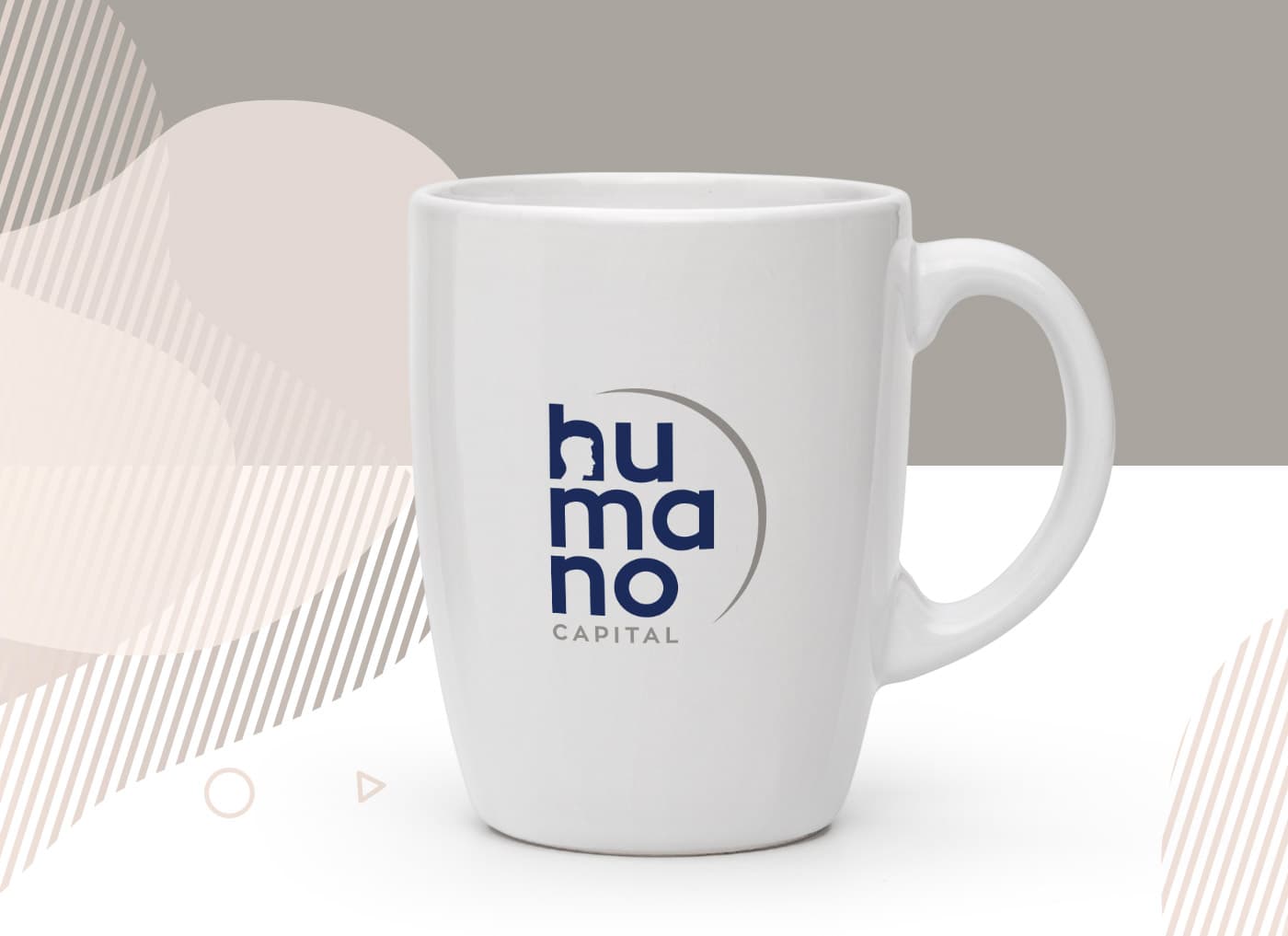 White ceramic mug with the logo applied in navy blue