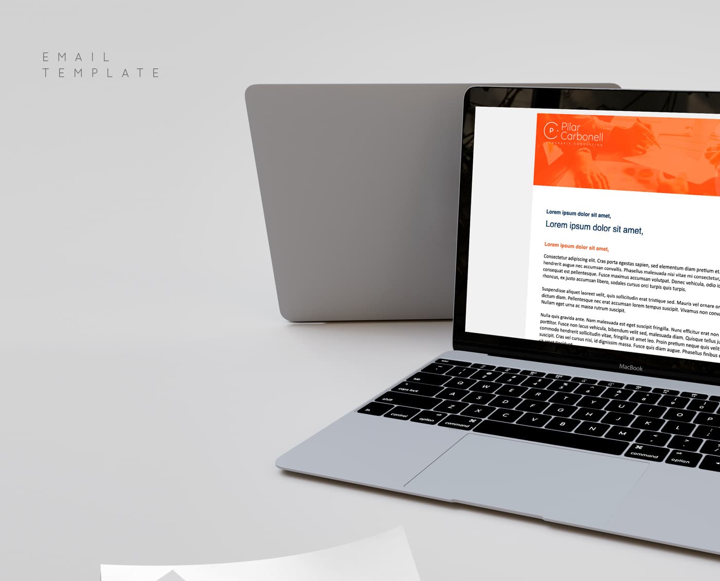 Laptop mockup with the email template and the brand's orange header