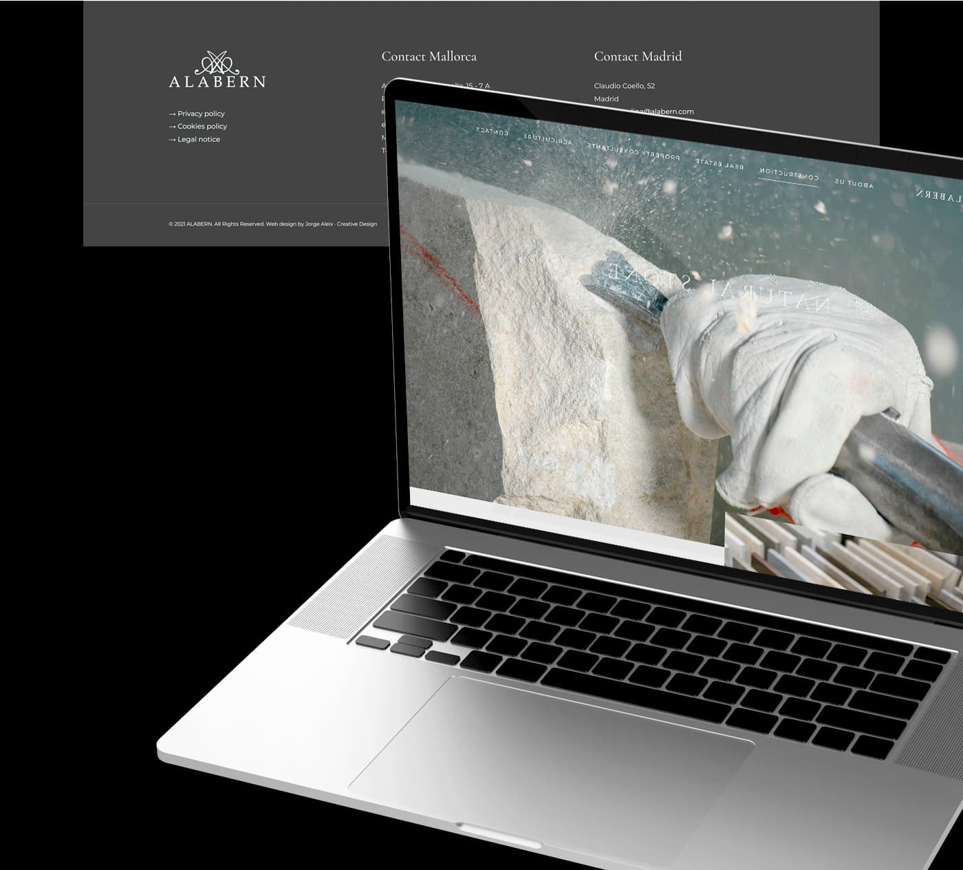 Laptop mockup with the Alabern website and the natural stone section