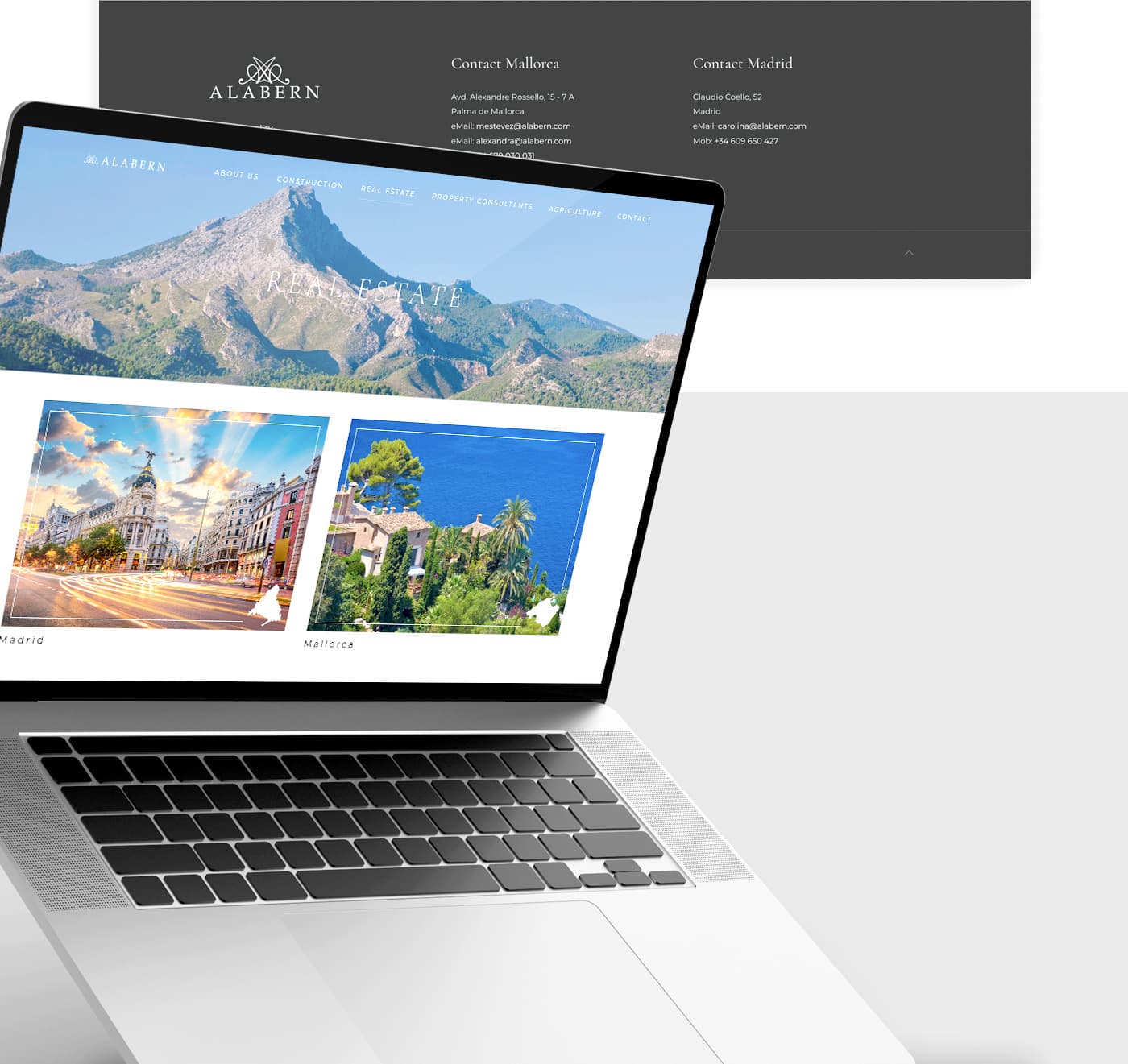 Laptop mockup with the Real Estate section and photos of Madrid and Mallorca