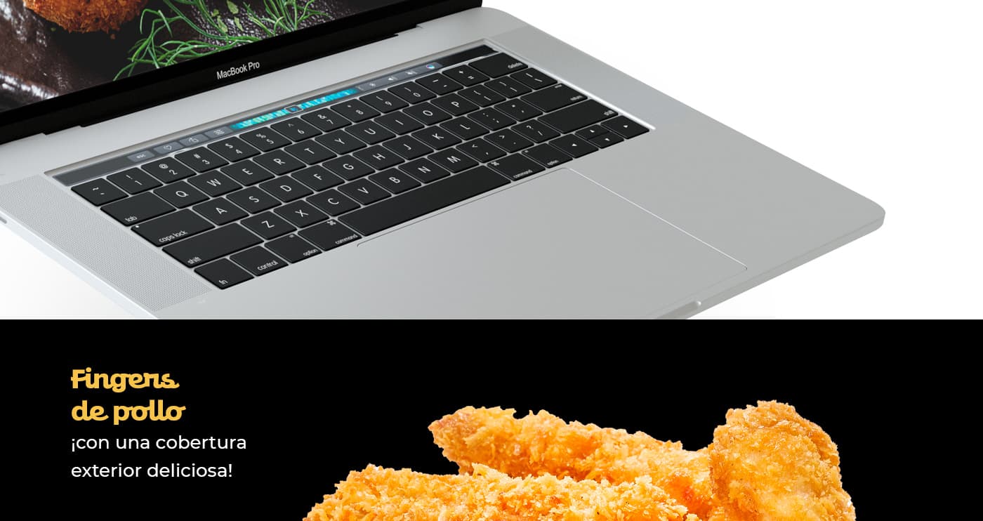 MacBook Pro obert al costat de fingers de pollastre arrebossats