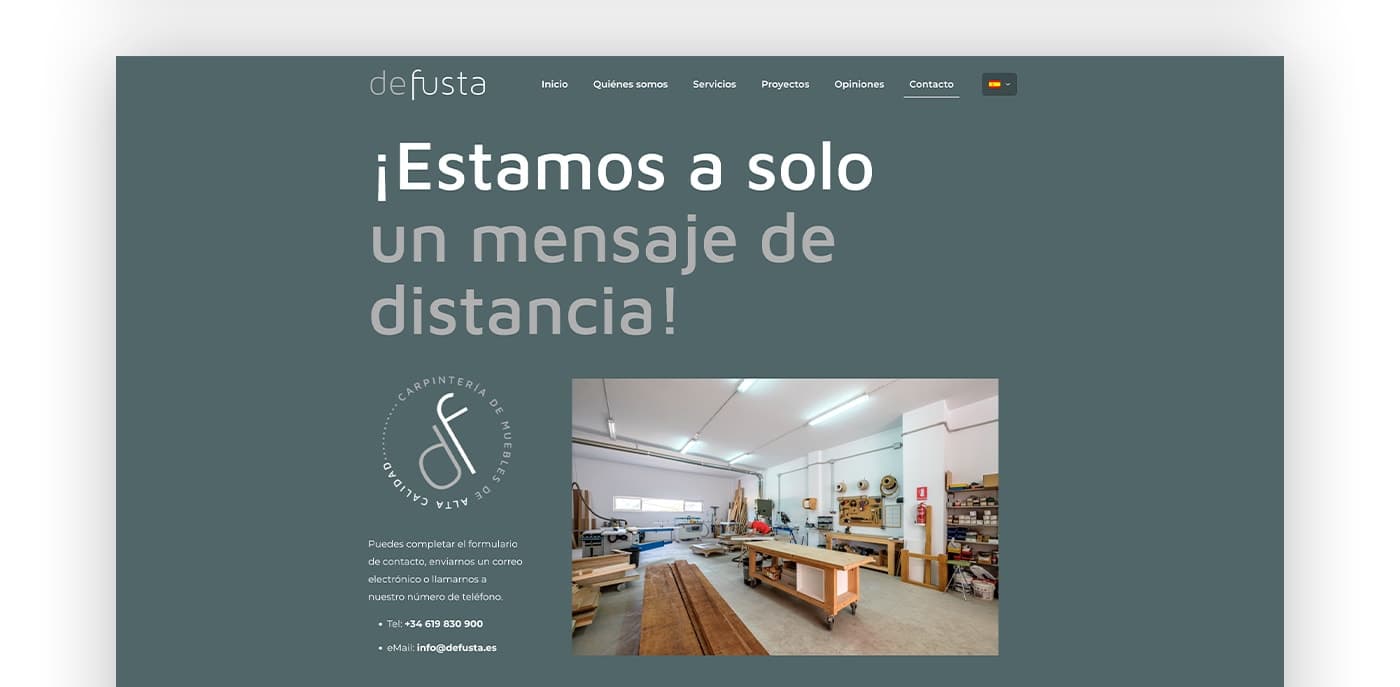 Contact page with Defusta's quality seal and a photo of the carpentry workshop