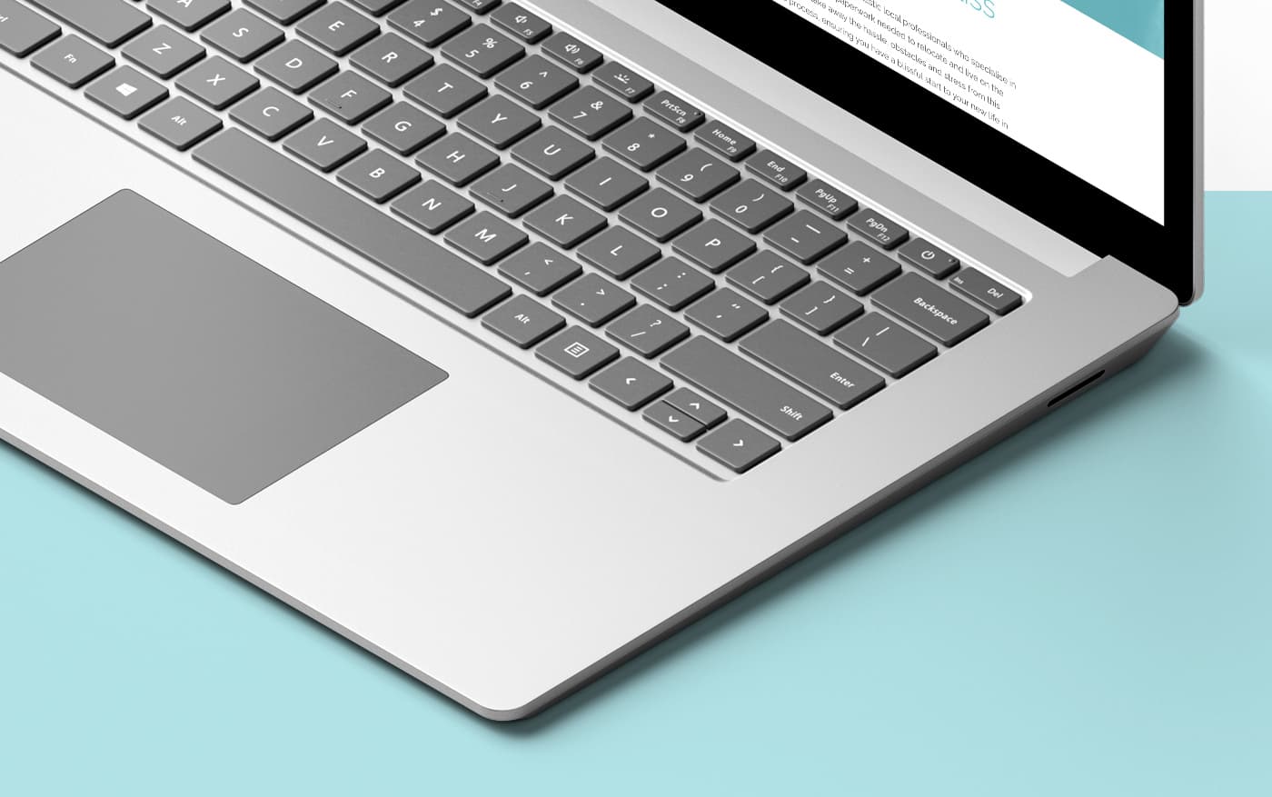 Detail of a laptop's keyboard and trackpad