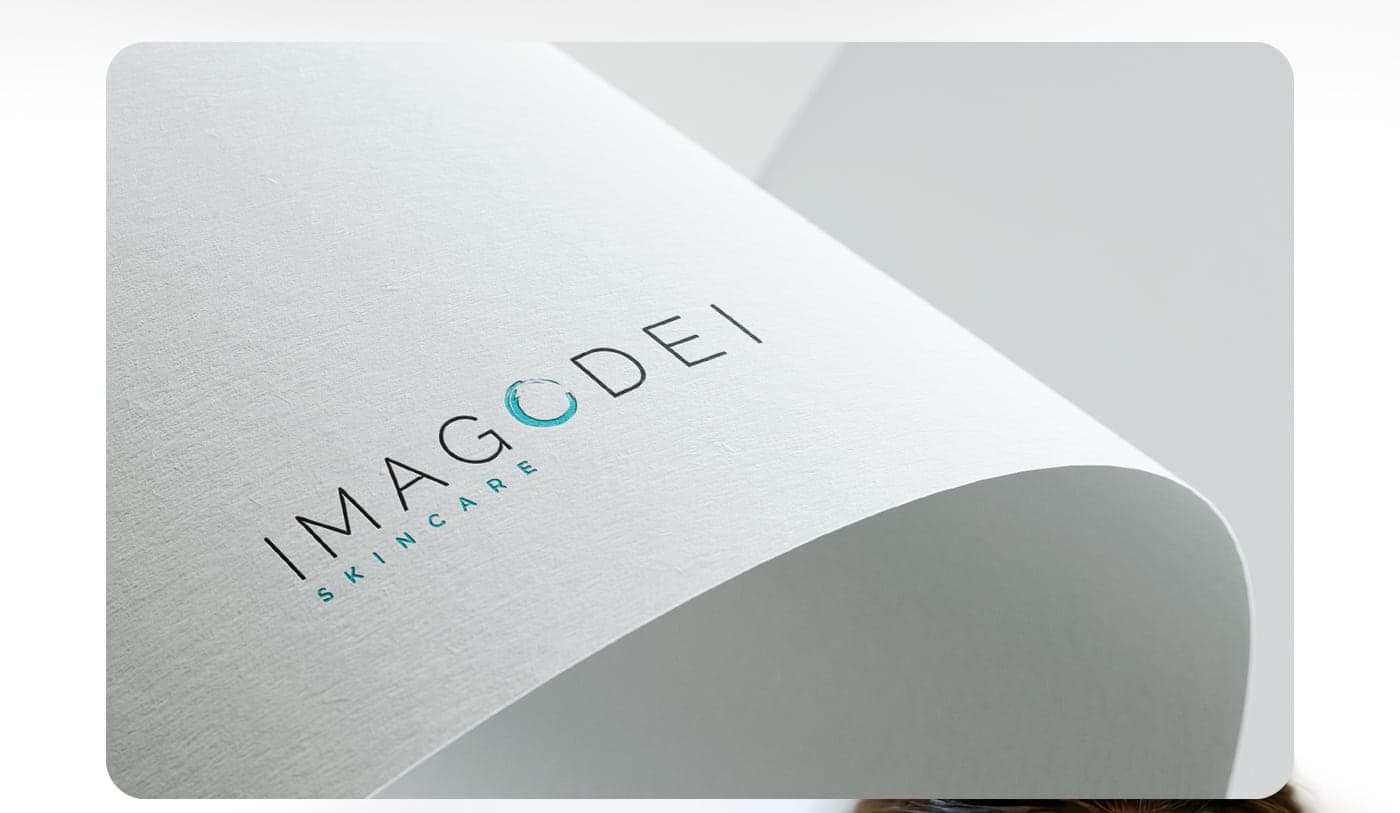 Macro detail of the logo embossed on curved paper