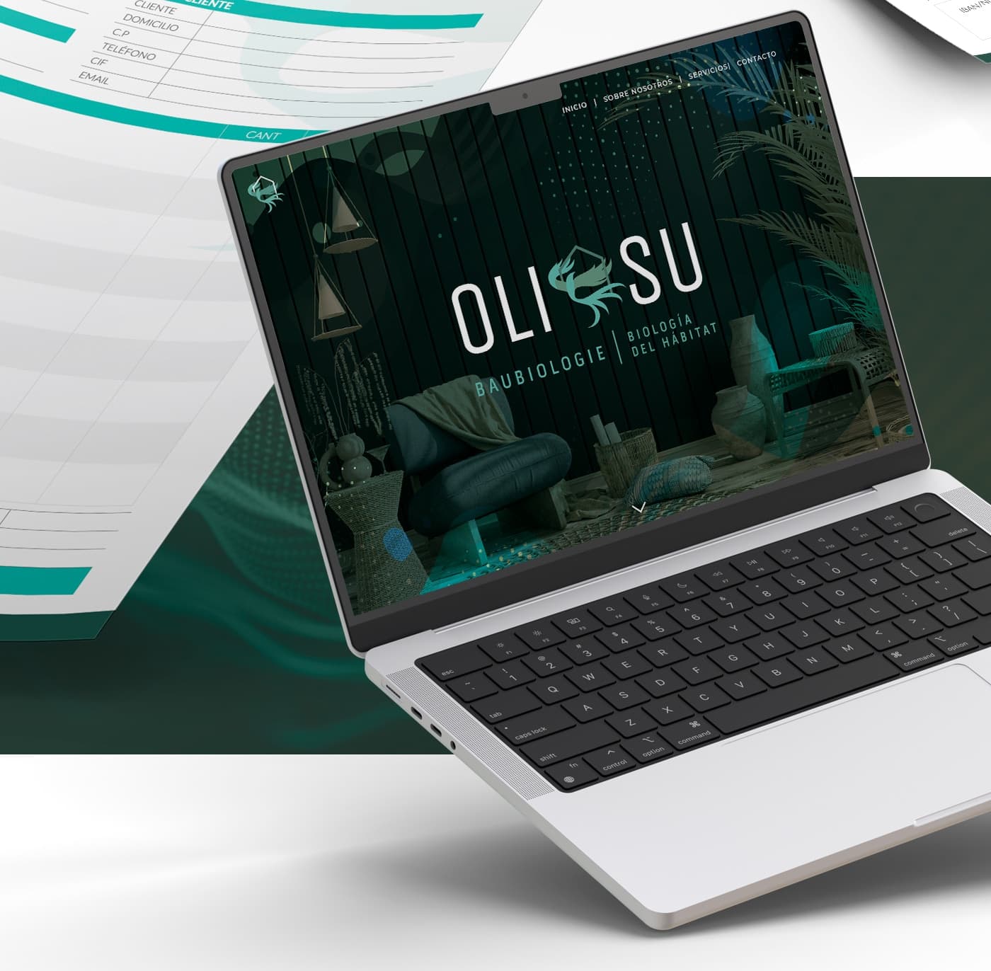Oli-Su website shown on a laptop next to printed documentation