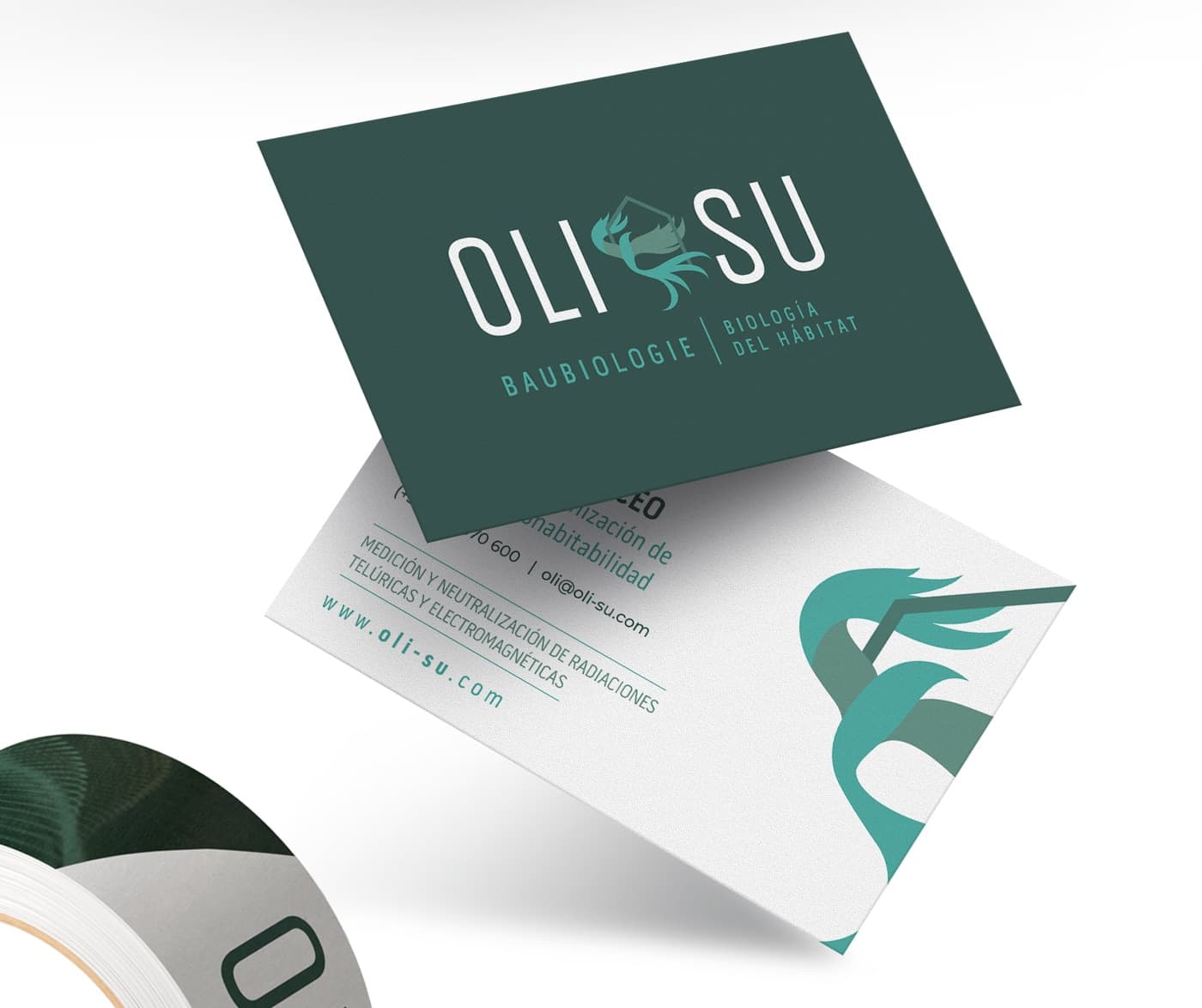 Green business cards with the logo and the bird symbol on the back