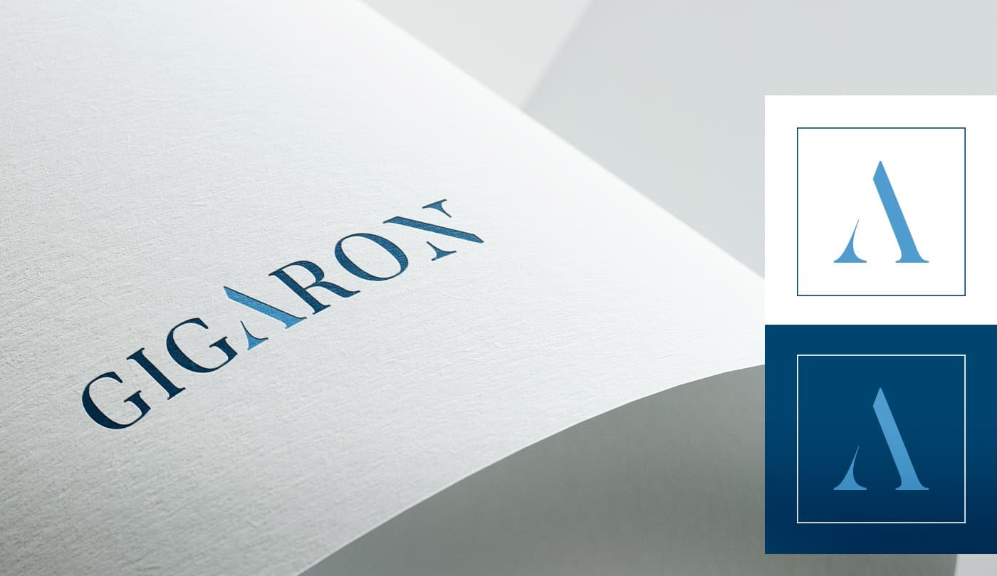 GIGARON logo embossed on paper and blue applications of the symbol