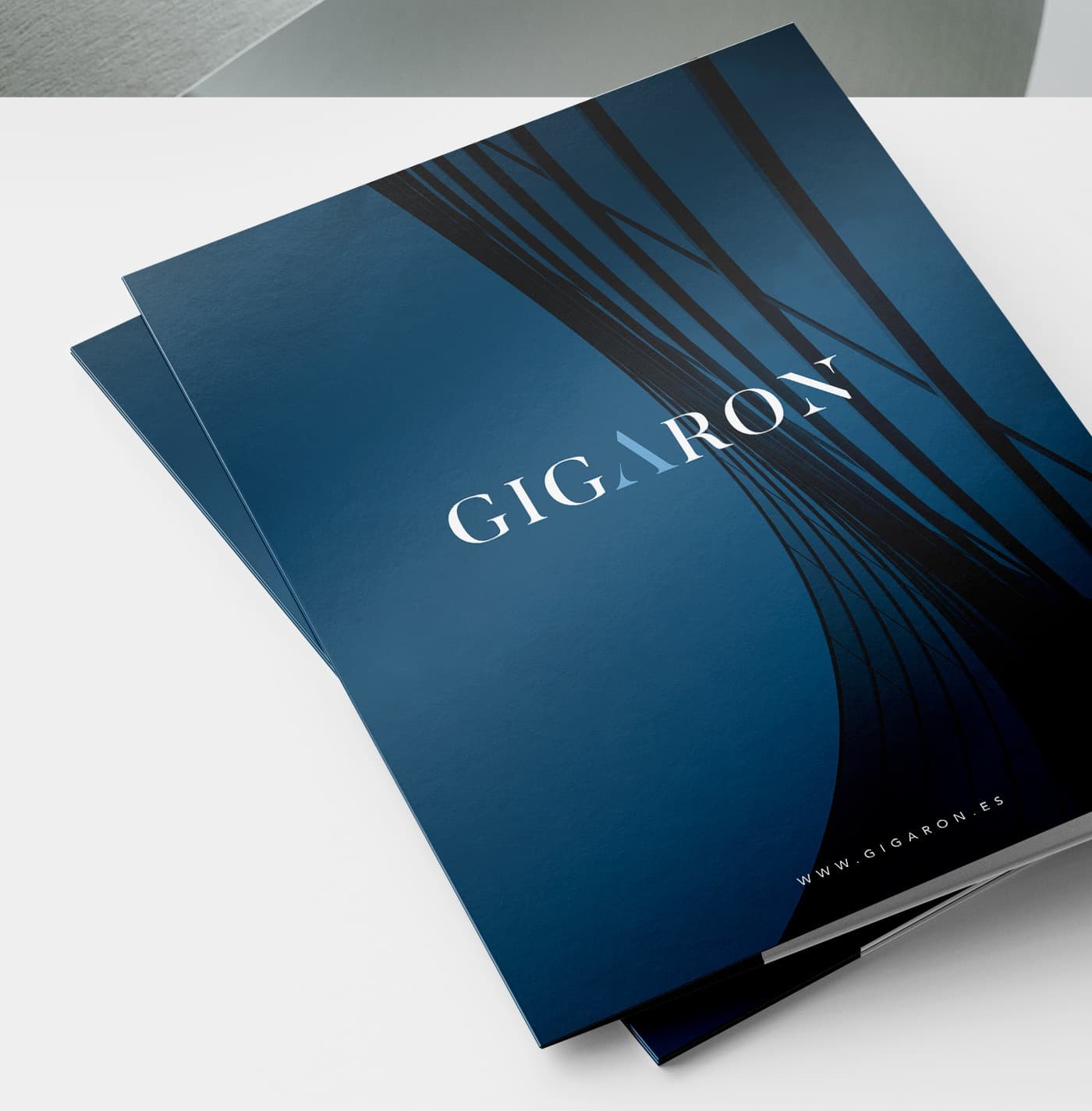 GIGARON corporate dossier mockup with dynamic dark blue lines